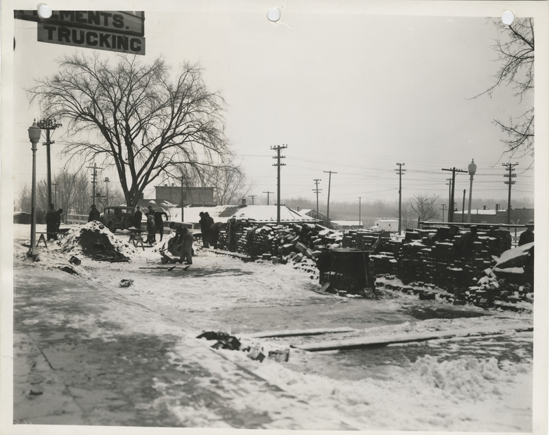 Photograph of people repaving streets in Columbus Junction