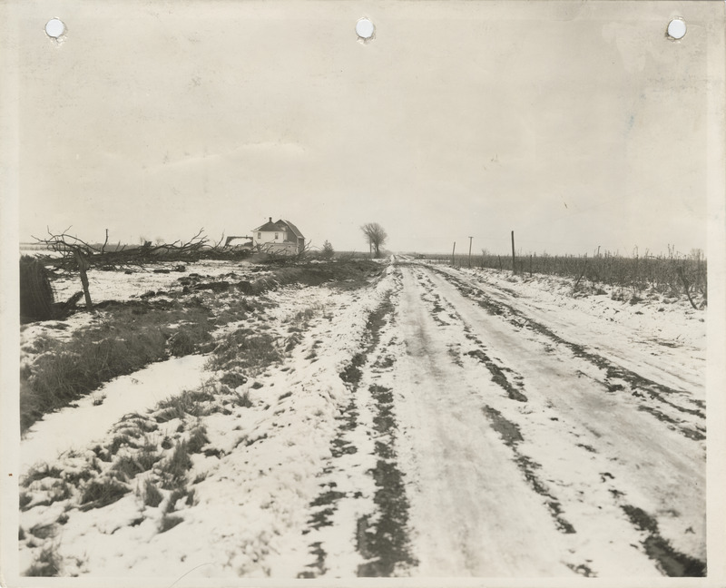 Photograph of a farm to market road where culverts are being built in Muscatine County