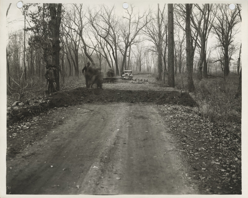 Photograph of grading and surfacing a road on Credit Island in Davenport