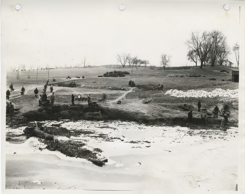 Photograph of people grading and widening Duck Creek in Davenport
