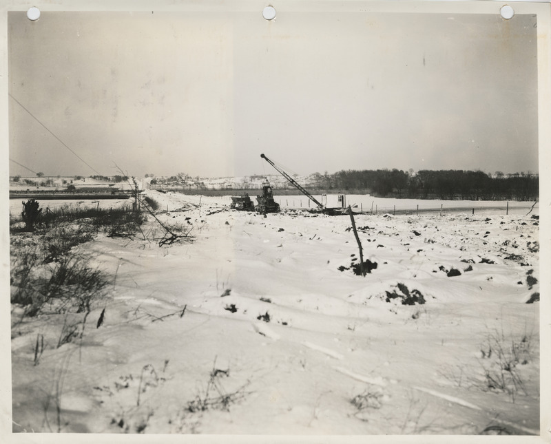 Photograph of grading and clearing a farm to market road in Van Buren County
