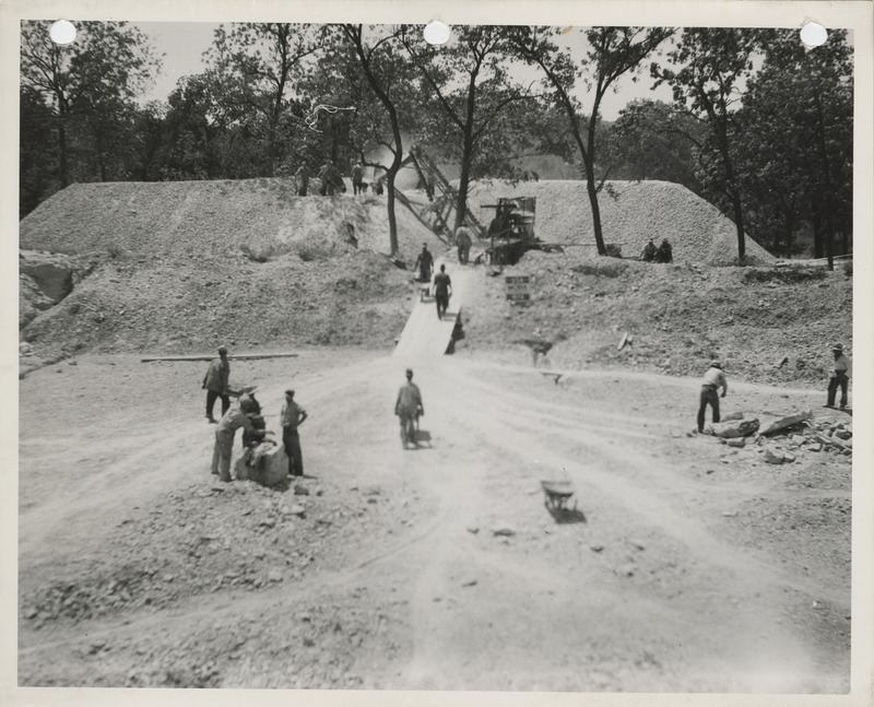 Photograph of people working to stockpile gravel for winter to spread on farm to market roads in Appanoose County