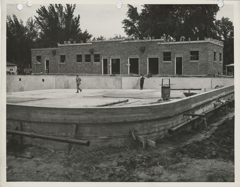 Photograph of people working on a swimming pool in Jefferson
