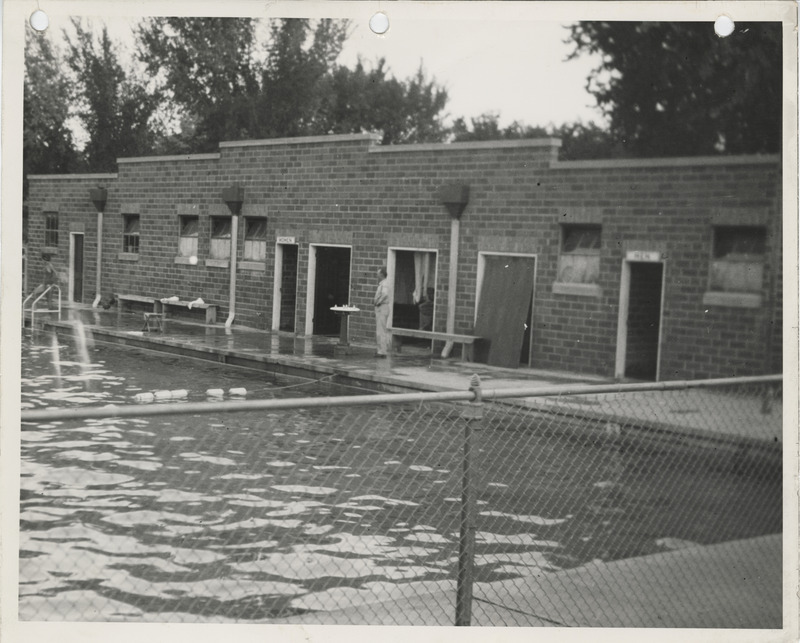Photograph of person standing by the edge of the municipal swimming pool in Jefferson