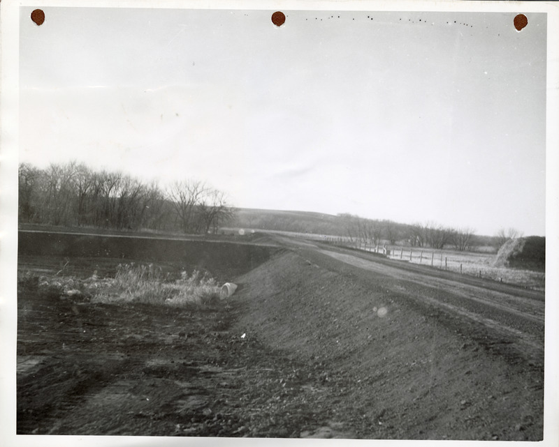 Photograph of the construction of ditches and culverts on a road in Guthrie County