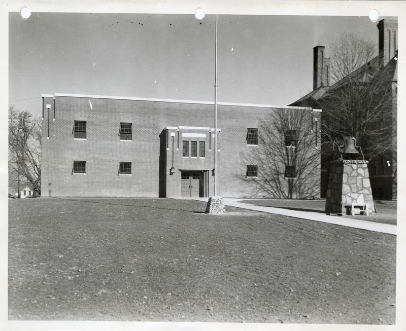 Photograph of the exterior view of the entrance to the high school gym in Panora