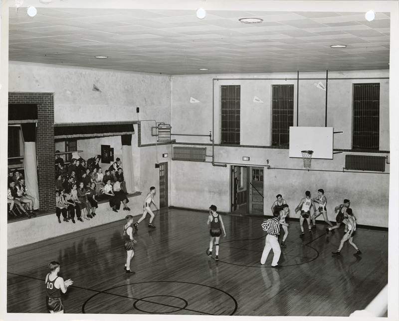 Photograph of a basketball game at the high school gym in Panora