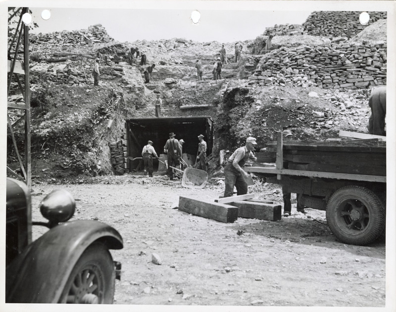 Photograph of people working by a quarry tunnel in Madison County