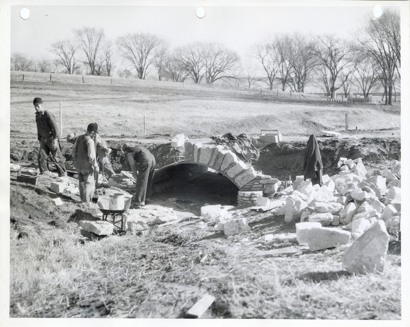 Photograph of people constructing a culvert at Edmundson Park in Oskaloosa