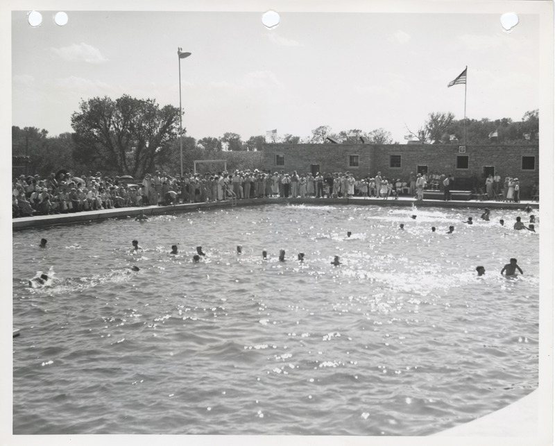 Photograph of people at the swimming pool at Edmundson Park in Oskaloosa