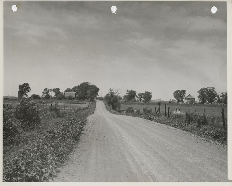 Photograph of a farm to market road one mile east of Melcher in Marion County