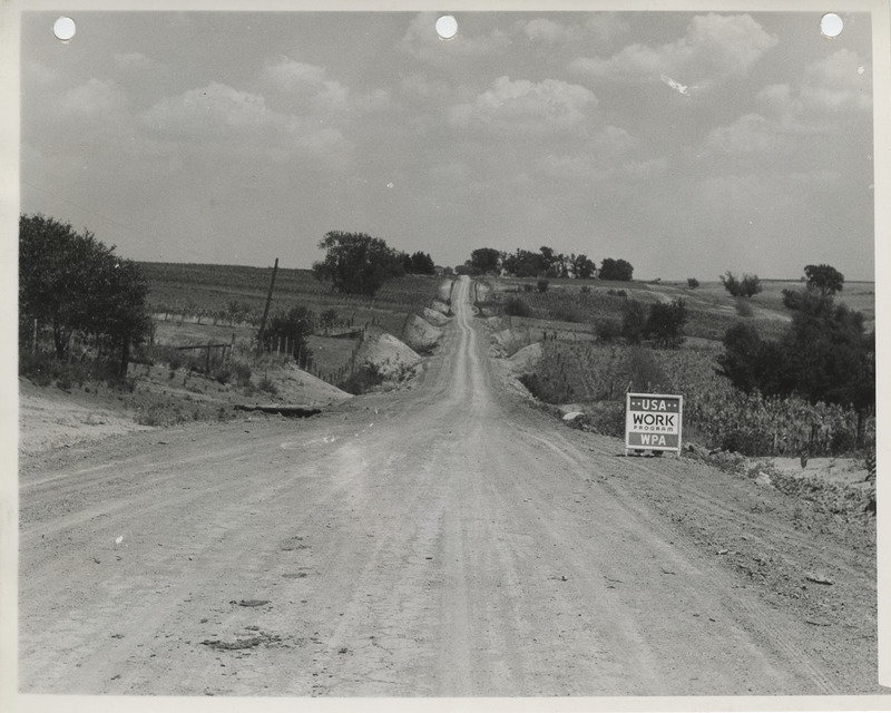 Photograph of a cleared and graded farm to market road in Monroe County