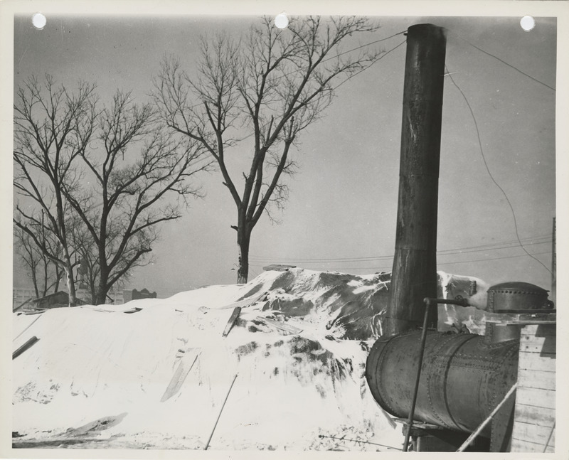 Photograph of heating for the construction of a bridge in Des Moines