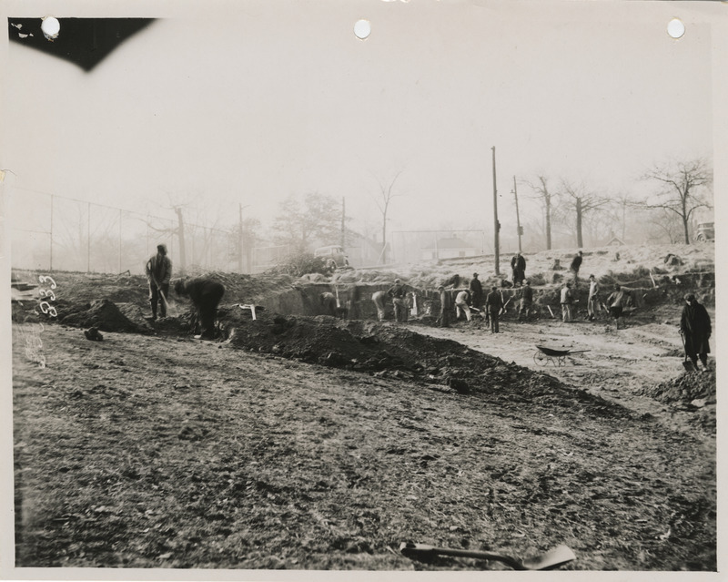 Photograph of people constructing a swimming pool at Good Park in Des Moines
