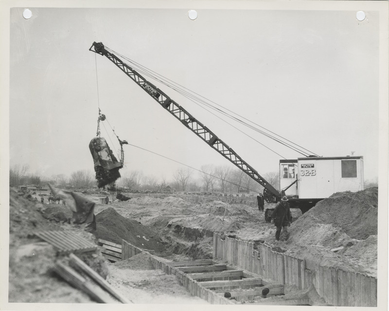 Photograph of a crane used in sewer construction in Des Moines