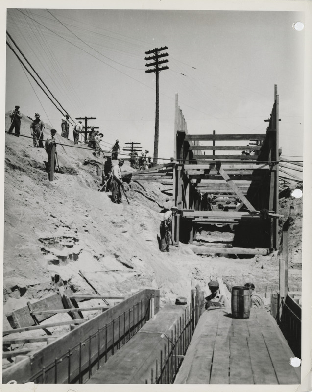 Photograph of the construction of a sanitary and storm sewer at E 20th and Walnut in Des Moines