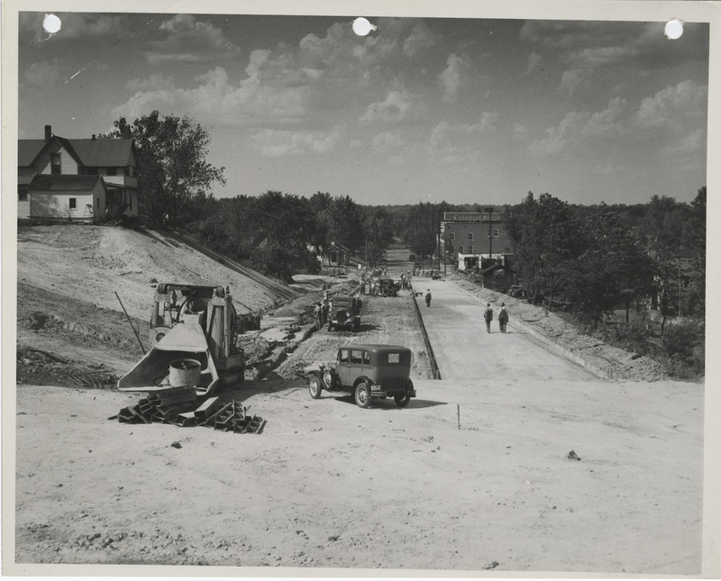 Photograph of people paving the first block of Second Street south of University in Des Moines