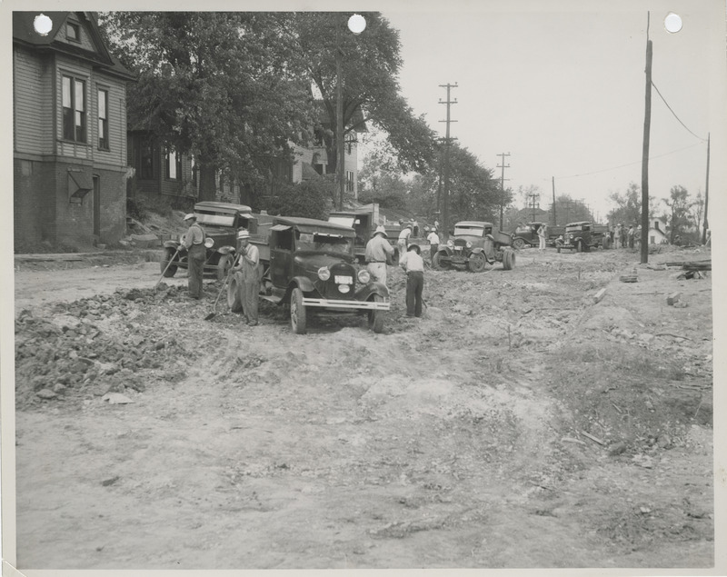 Photograph of people grading and widening Second Street near School in Des Moines