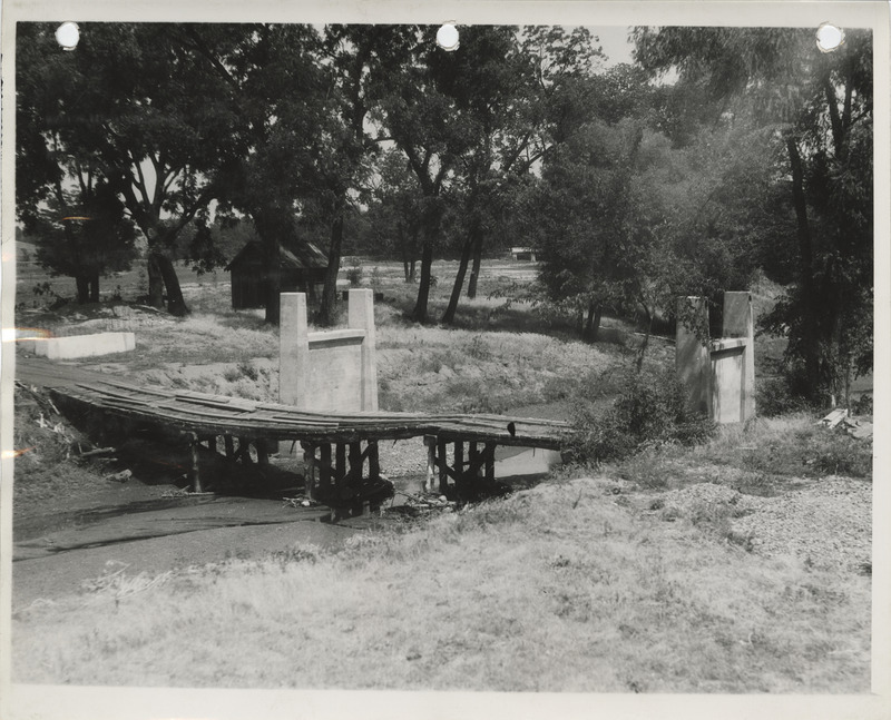 Photograph of a concrete bridge on the college golf course in Ames