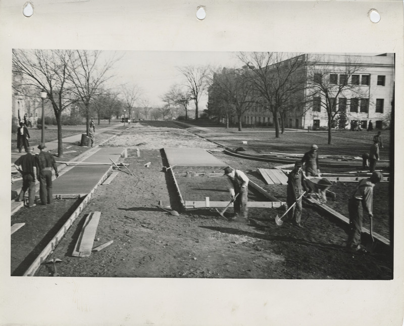 Photograph of people paving streets on the Iowa State College campus in Ames