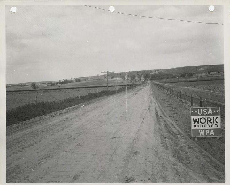 Photograph of farm-to-market road and bridge under construction in Missouri Valley