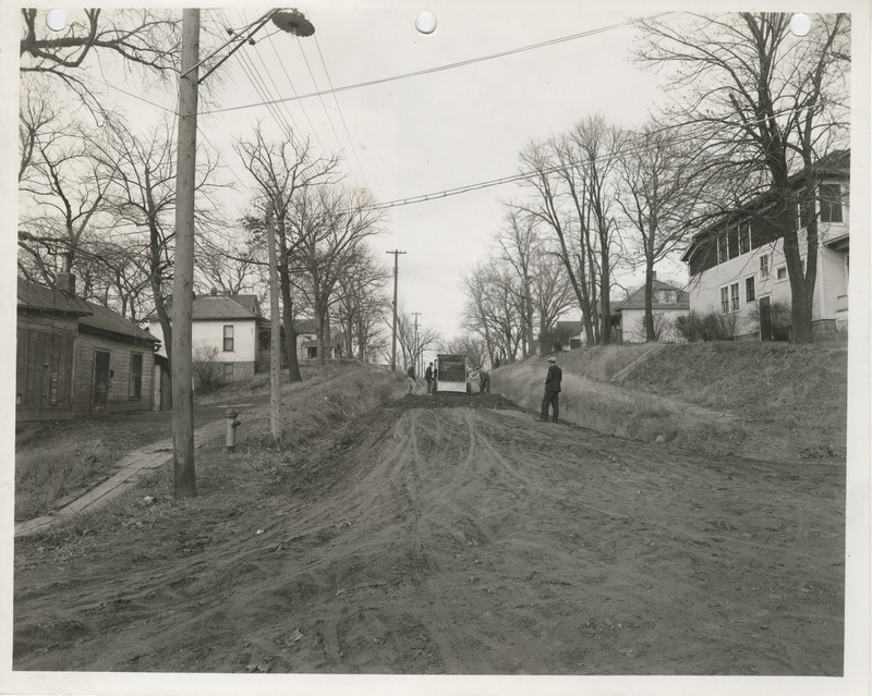 Photograph of people grading and paving Hazel Street in Council Bluffs
