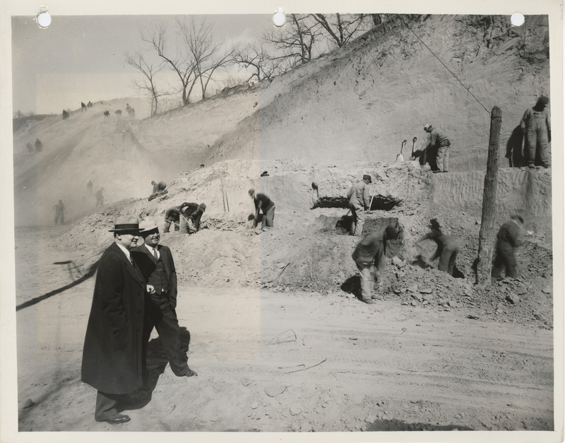 Photograph of people inspecting a hill in Council Bluffs