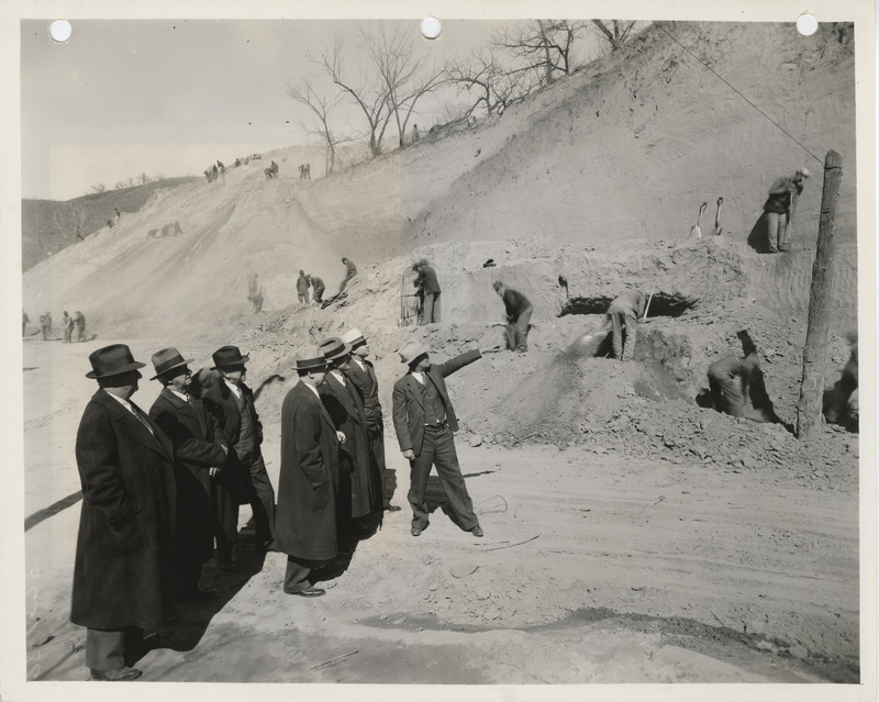 Photograph of people inspecting a hill in Council Bluffs