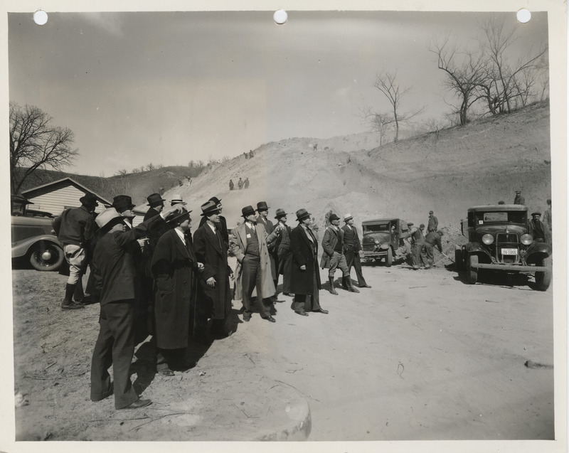 Photograph of people inspecting a hill in Council Bluffs