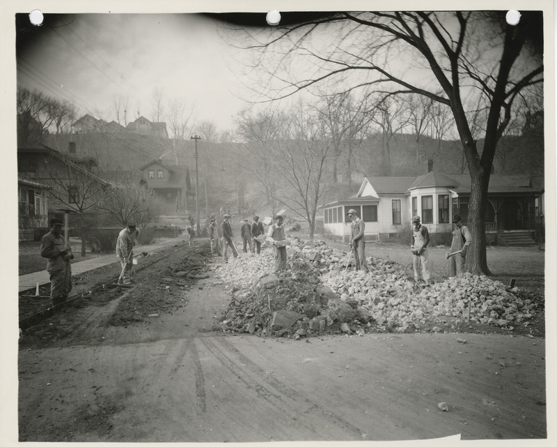 Photograph of people paving Railroad Avenue in Council Bluffs
