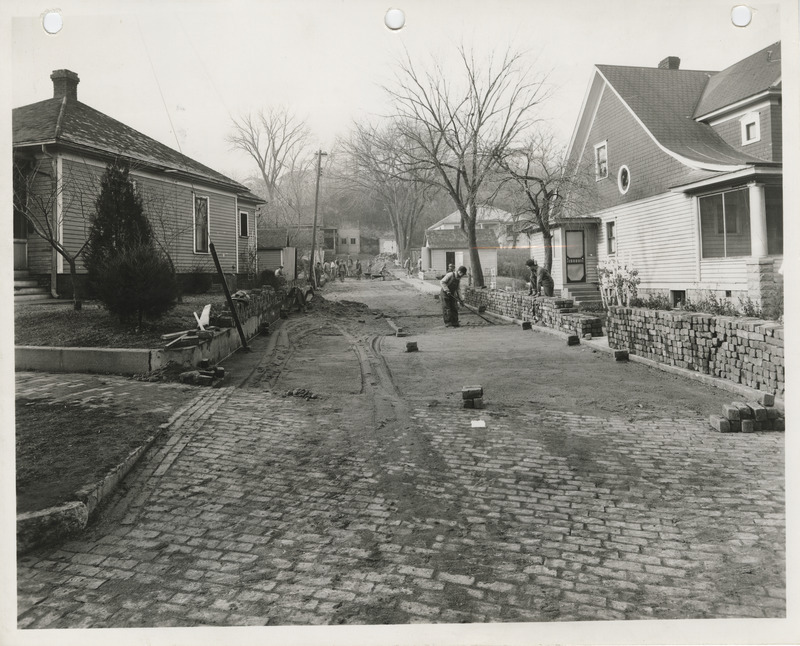 Photograph of people paving West Madison Avenue in Council Bluffs