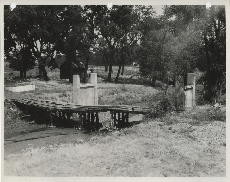 Photograph of a wooden bridge on the college golf course in Ames