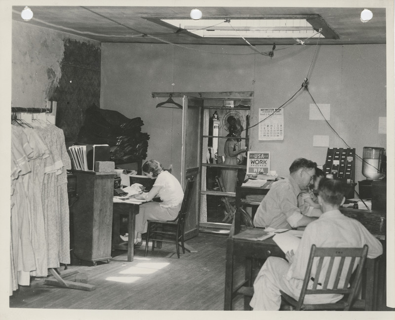 Photograph of people taking inventory of surplus commodities in Centerville