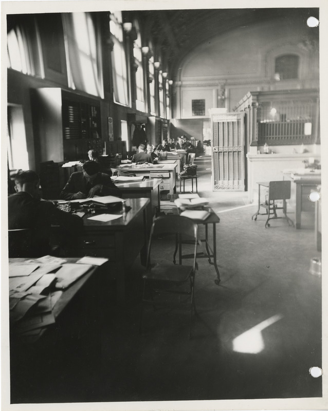 Photograph of people working in the finance department at the city hall in Des Moines