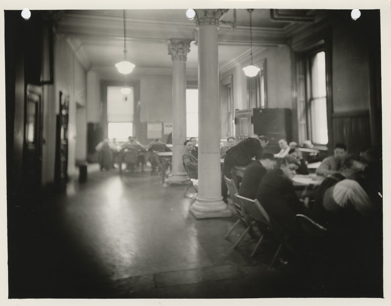 Photograph of people working at the tabulating office for zoning and planning at 109 Old Federal Building in Des Moines
