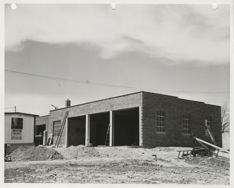 Photograph of the construction of a maintenance shed in Boone
