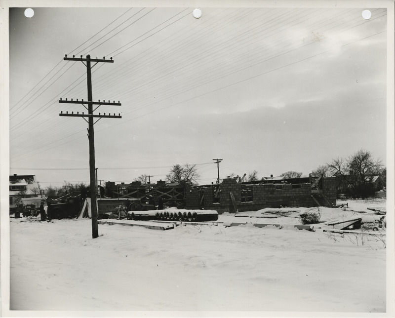 Photograph of the construction of a maintenance shed in Dakota City