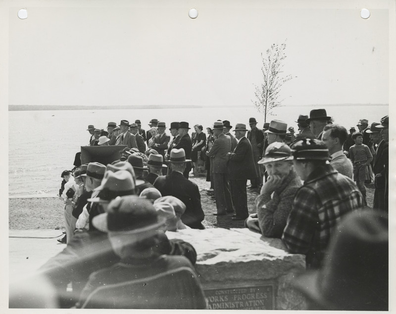 Photograph of group of people gathered during the dedication of lakeshore improvements event