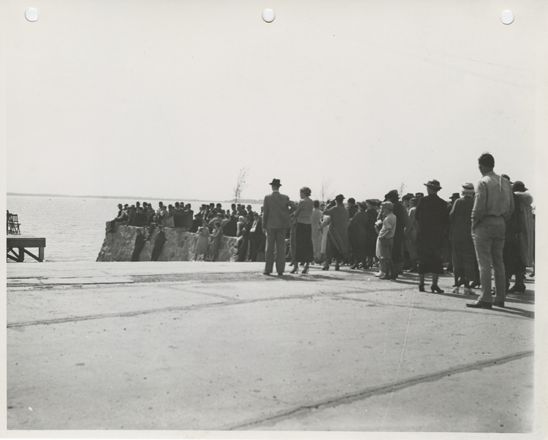 Photograph of group of people gathered during the dedication of lakeshore improvements event