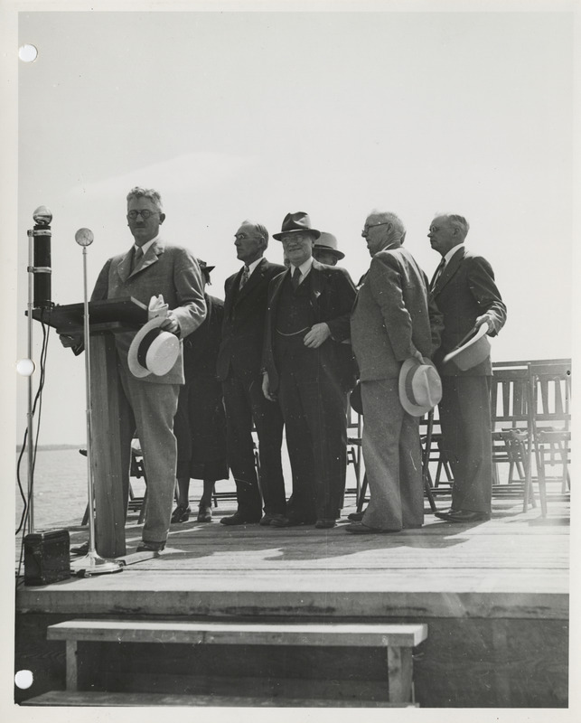 Photograph of group of people gathered during the dedication of lakeshore improvements event