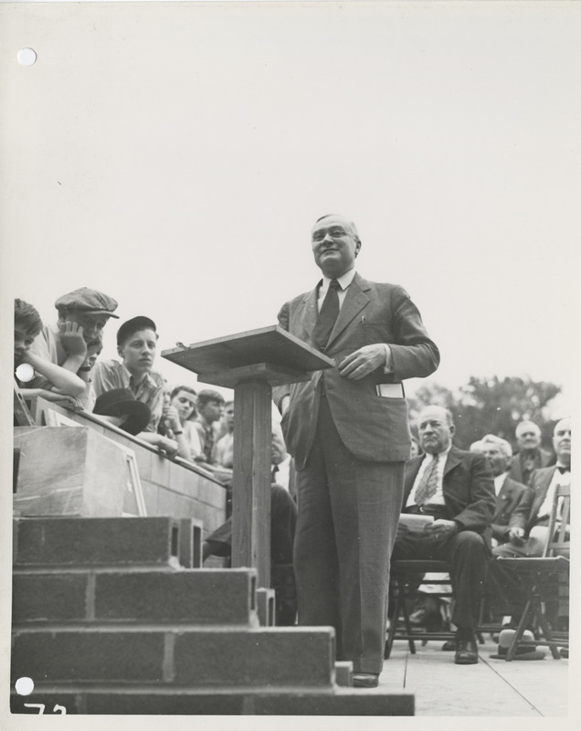 Photograph of group of people gathered during the dedication of bathhouse and shelter house in Riverview Park
