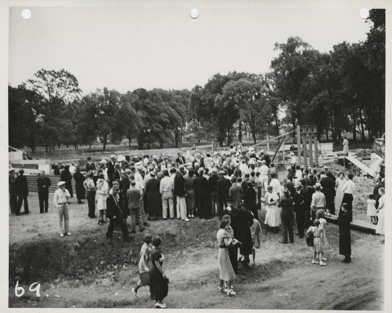 Photograph of group of people gathered during the dedication of bathhouse and shelter house in Riverview Park