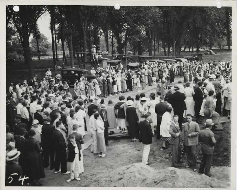 Photograph of group of people gathered during the dedication of bathhouse and shelter house in Riverview Park
