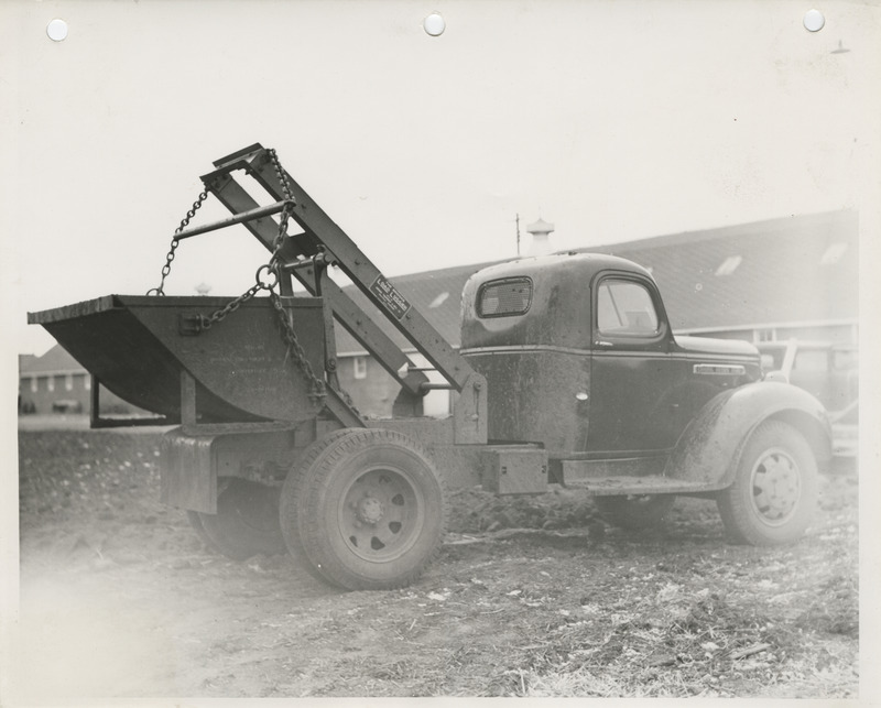 Photograph of load lugger operating in Clay County Fairgrounds