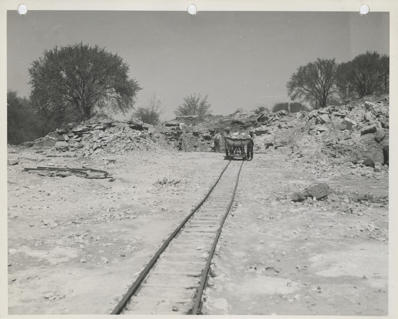 Photograph of men working at the stone quarry in Louisa County to build farm-to-market roads