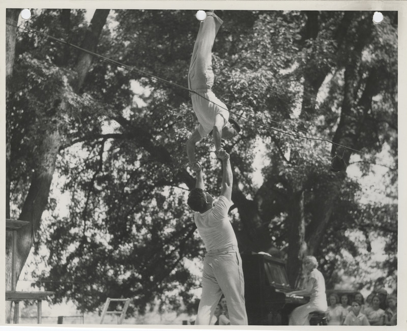 Photograph of actors and musicians performing