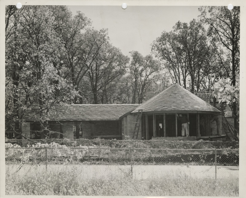 Photograph of a timber and stone shelter house at Clear Lake State Park in Cerro Gordo County