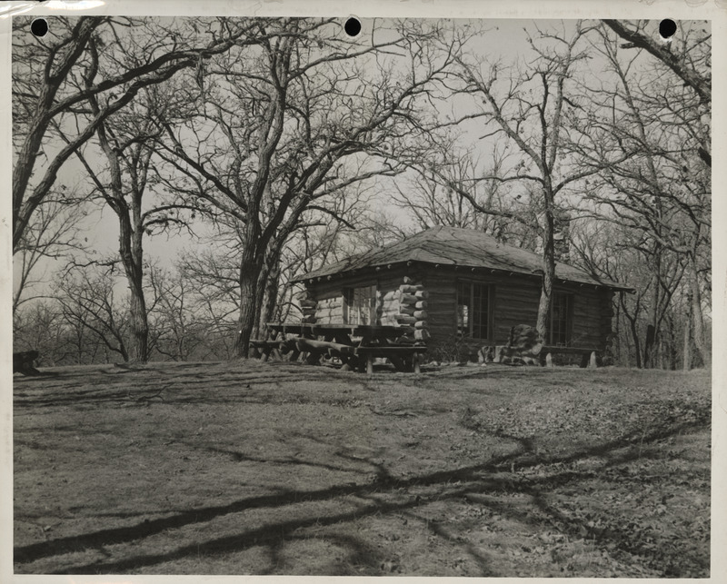 Photograph of a log cabin near the north entrance to Dolliver State Park in Webster County