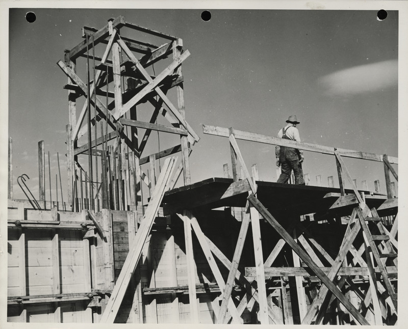 Photograph of a person constructing the city maintenance and equipment garage in Muscatine