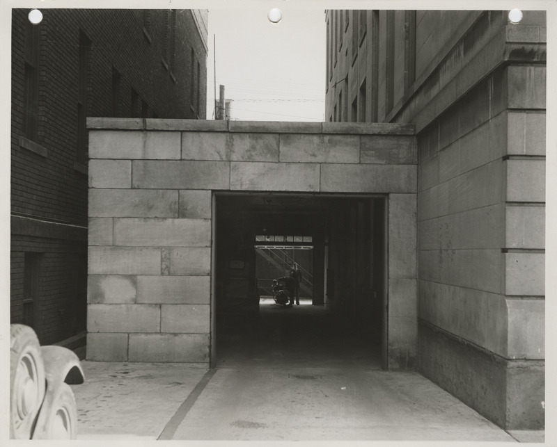 Photograph of the exterior of the police garage at city hall in Muscatine